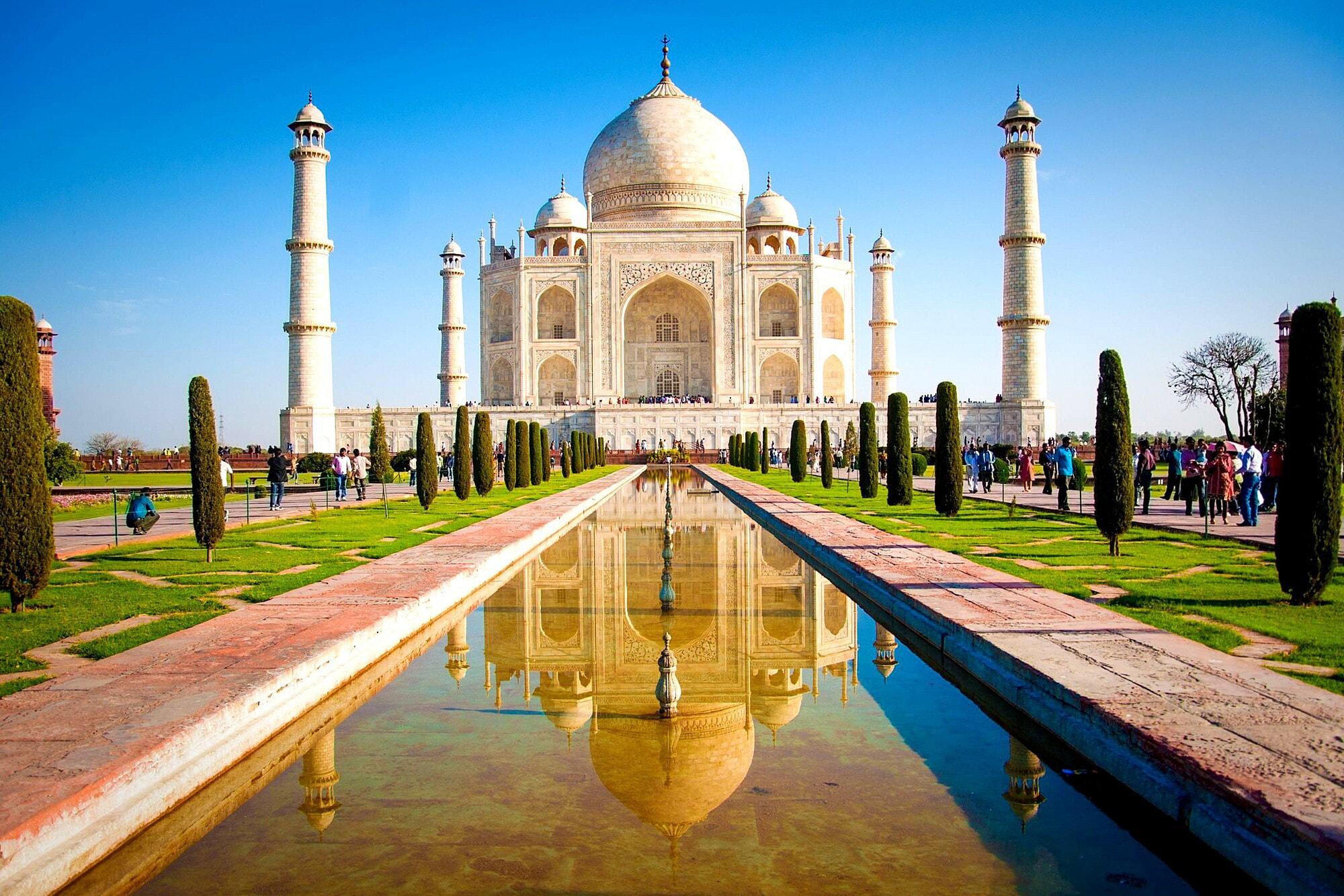 A glistening white picture of the Taj Mahal