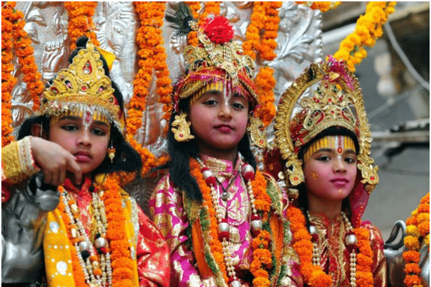 Children dressed up as Lord Ram, Lakshman, and Sita