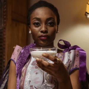 Woman posing with the glass of Lugdi